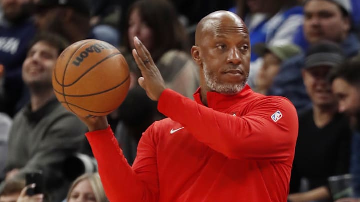 Nov 8, 2024; Minneapolis, Minnesota, USA; Portland Trail Blazers head coach Chauncey Billups returns a ball during the third quarter against the Minnesota Timberwolves at Target Center. Mandatory Credit: Bruce Kluckhohn-Imagn Images