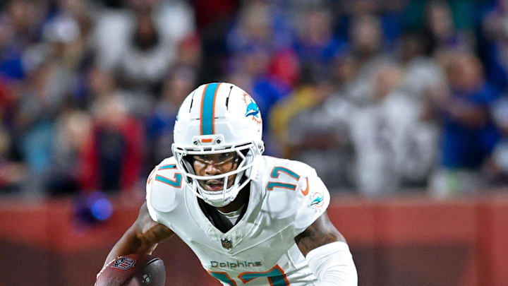 Miami Dolphins wide receiver Jaylen Waddle (17) carries the ball after making a catch in the fourth quarter against the Buffalo Bills at Highmark Stadium in Week 3. Miami Dolphins wide receiver Jaylen Waddle (17) carries the ball after making a catch in the fourth quarter against the Buffalo Bills at Highmark Stadium in Week 3.