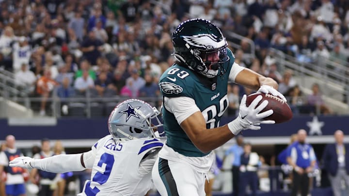 Nov 10, 2024; Arlington, Texas, USA; Philadelphia Eagles wide receiver Jahan Dotson (83) catches a touchdown pass against Dallas Cowboys cornerback Jourdan Lewis (2) in the third quarter at AT&T Stadium. Mandatory Credit: Tim Heitman-Imagn Images