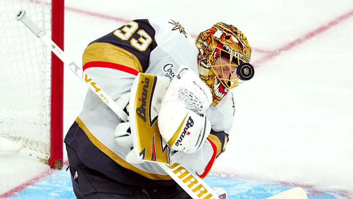 Mar 14, 2026; Las Vegas, Nevada, USA; Vegas Golden Knights goaltender Adin Hill (33) makes a save against the Chicago Blackhawks during the third period at T-Mobile Arena. Mandatory Credit: Stephen R. Sylvanie-Imagn Images