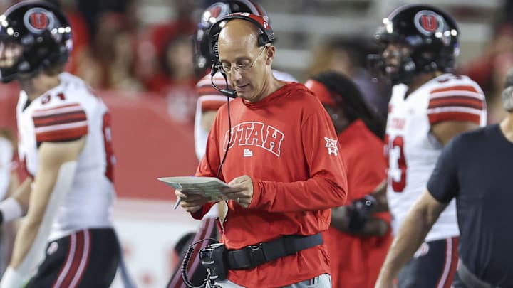Oct 26, 2024; Houston, Texas, USA; Utah Utes offensive coordinator Mike Bajakian walks on the field during the game against the Houston Cougars at TDECU Stadium. Mandatory Credit: Troy Taormina-Imagn Images Oct 26, 2024; Houston, Texas, USA; Utah Utes offensive coordinator Mike Bajakian walks on the field during the game against the Houston Cougars at TDECU Stadium. Mandatory Credit: Troy Taormina-Imagn Images