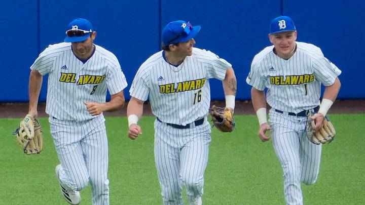 Delaware outfielders (from left) Anthony Charles, Vincent Davis and Sal Mineo join their teammates in celebration after the Blue Hens’ 5-4 win against Dallas Baptist to open a Conference USA weekend series at Bob Hannah Stadium, March 20, 2026. Delaware outfielders (from left) Anthony Charles, Vincent Davis and Sal Mineo join their teammates in celebration after the Blue Hens’ 5-4 win against Dallas Baptist to open a Conference USA weekend series at Bob Hannah Stadium, March 20, 2026.
