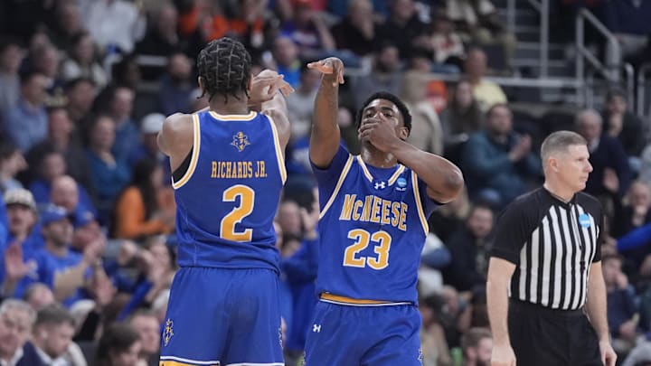 McNeese State Cowboys guard Brandon Murray (23) celebrates with guard DJ Richards Jr. (2)