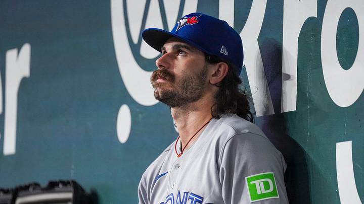 Sep 18, 2026; Arlington, Texas, USA;  Toronto Blue Jays pitcher Dylan Cease (84) sits in the dugout after being relieved in the third inning after pitching 2 2/3 innings, with six walks and three strike outs against the Texas Rangers at Globe Life Field. Mandatory Credit: Raymond Carlin III-Imagn Images
