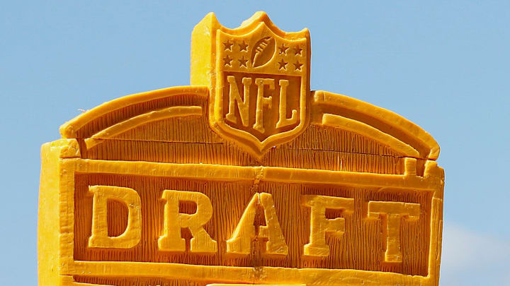 The 2025 NFL Draft logo is seen carved into blocks of cheese during the third and final day of the 2025 NFL Draft on Saturday, April 26, 2025, at Lambeau Field in Green Bay, Wisconsin. 