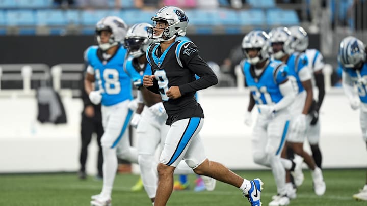 Aug 2, 2025; Charlottle, NC, USA; Carolina Panthers quarterback Bryce Young (9) jogs to the huddleduring Fanfest at Bank of America Stadium. Mandatory Credit: Jim Dedmon-Imagn Images Aug 2, 2025; Charlottle, NC, USA; Carolina Panthers quarterback Bryce Young (9) jogs to the huddleduring Fanfest at Bank of America Stadium. Mandatory Credit: Jim Dedmon-Imagn Images