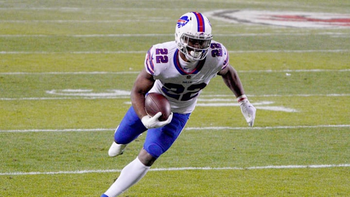 Jan 24, 2021; Kansas City, Missouri, USA; Buffalo Bills running back T.J. Yeldon (22) runs the ball in the AFC Championship Game against the Kansas City Chiefs at Arrowhead Stadium. Mandatory Credit: Denny Medley-Imagn Images