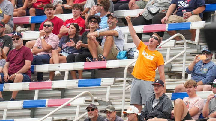 A lone Tennessee Volunteer fan woos during Rocky Top during a Major League Baseball game between the Atlanta Brave and Cincinnati Reds at Bristol Motor Speedway on August 3, 2025.
