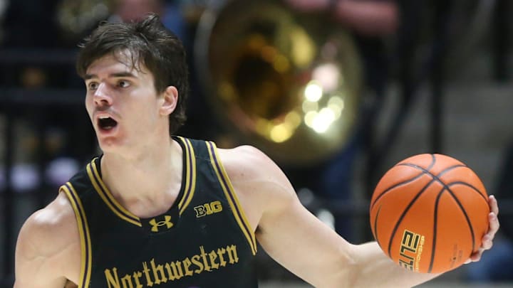 Northwestern Wildcats guard Brooks Barnhizer (13) drives to the basket Sunday, Jan. 5, 2025, during the NCAA men’s basketball game against the Purdue Boilermakers at Mackey Arena in West Lafayette, Ind.