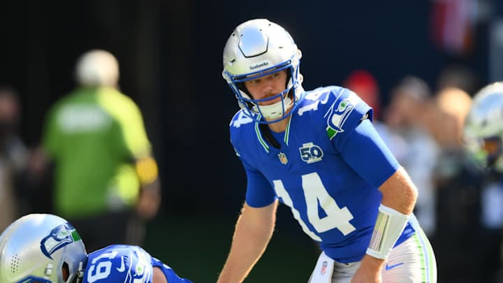 Oct 5, 2025; Seattle, Washington, USA; Seattle Seahawks quarterback Sam Darnold (14) on the field for warm ups prior to a game against the Tampa Bay Buccaneers at Lumen Field. 