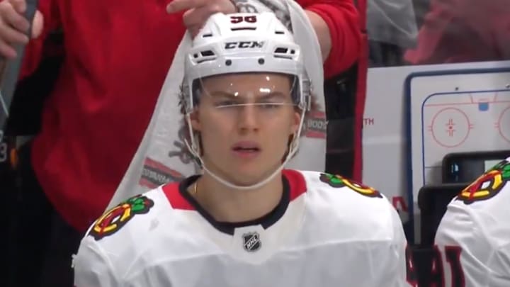 Connor Bedard reacts to a misconduct penalty.