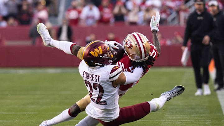 Dec 24, 2022; Santa Clara, California, USA; Washington Commanders safety Darrick Forrest (22) tackles San Francisco 49ers wide receiver Brandon Aiyuk (11) during the fourth quarter at Levi's Stadium. Mandatory Credit: Stan Szeto-Imagn Images Dec 24, 2022; Santa Clara, California, USA; Washington Commanders safety Darrick Forrest (22) tackles San Francisco 49ers wide receiver Brandon Aiyuk (11) during the fourth quarter at Levi's Stadium. Mandatory Credit: Stan Szeto-Imagn Images
