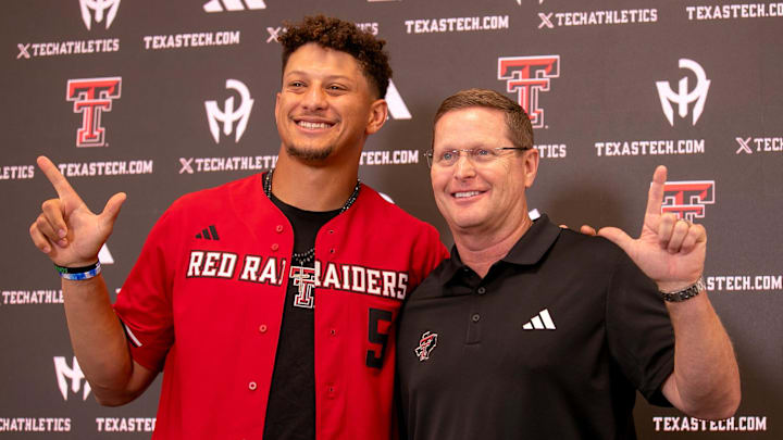 Kansas City Chiefs quarterback Patrick Mahomes and Texas Tech director of athletics Kirby Hocutt pose for a photo following a press conference at Jones AT&T Stadium, Friday, August 23, 2024.