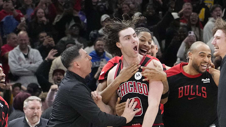 Mar 27, 2025; Chicago, Illinois, USA; Chicago Bulls guard Josh Giddey (3) celebrates with teammates after making the game-winning three point basket against the Los Angeles Lakers during the second half at United Center. Mandatory Credit: David Banks-Imagn Images