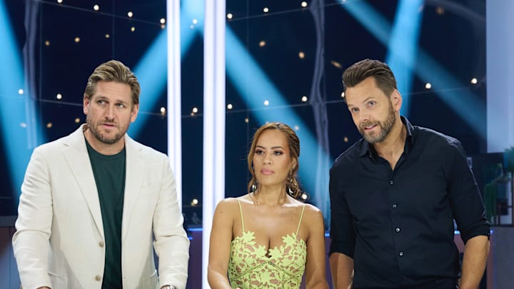 CRIME SCENE KITCHEN: L-R: Judges Curtis Stone and Yolanda Gampp with Host Joel McHale in the CRIME SCENE KITCHEN episode airing Thursday, Nov. 21 (9:01-10:00 PM ET/PT) on FOX. CR/ FOX ©2024 FOX Media LLC.