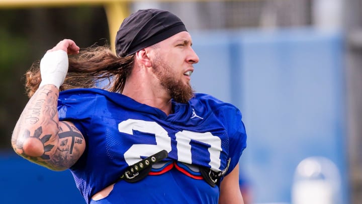 Former Husky safety Asa Turner takes a breather between drills during the Florida Gators' spring football practice.