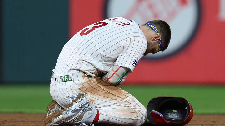 Aug 5, 2026; Philadelphia, Pennsylvania, USA; Philadelphia Phillies first baseman Bryce Harper (3) crouches on the infield after being injured on a slide into second base during the tenth inning against the Washington Nationals at Citizens Bank Park. Mandatory Credit: Bill Streicher-Imagn Images Aug 5, 2026; Philadelphia, Pennsylvania, USA; Philadelphia Phillies first baseman Bryce Harper (3) crouches on the infield after being injured on a slide into second base during the tenth inning against the Washington Nationals at Citizens Bank Park. Mandatory Credit: Bill Streicher-Imagn Images