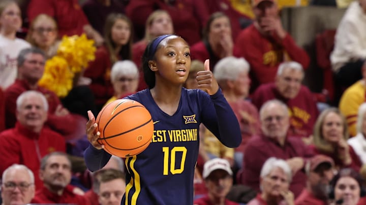 Jan 11, 2026; Ames, Iowa, USA; West Virginia Mountaineers guard Jordan Harrison (10) sets the offense against the Iowa State Cyclones during the second half at James H. Hilton Coliseum. Mandatory Credit: Reese Strickland-Imagn Images Jan 11, 2026; Ames, Iowa, USA; West Virginia Mountaineers guard Jordan Harrison (10) sets the offense against the Iowa State Cyclones during the second half at James H. Hilton Coliseum. Mandatory Credit: Reese Strickland-Imagn Images