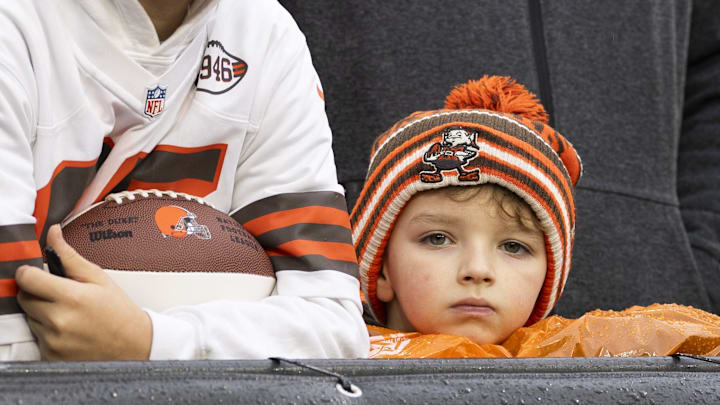 Dec 29, 2024; Cleveland, Ohio, USA; A Cleveland Browns fan watches warmups before the game against the Miami Dolphins at Huntington Bank Field. Mandatory Credit: Scott Galvin-Imagn Images