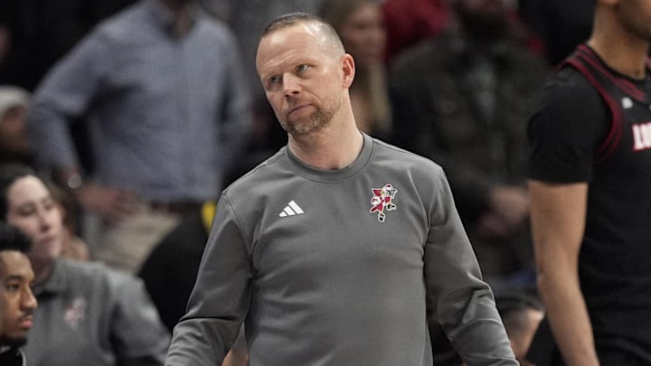 Mar 15, 2025; Charlotte, NC, USA; Louisville Cardinals head coach Pat Kelsey reacts after losing the 2025 ACC Conference Championship game against the Duke Blue Devils at Spectrum Center. Mandatory Credit: Jim Dedmon-Imagn Images Mar 15, 2025; Charlotte, NC, USA; Louisville Cardinals head coach Pat Kelsey reacts after losing the 2025 ACC Conference Championship game against the Duke Blue Devils at Spectrum Center. Mandatory Credit: Jim Dedmon-Imagn Images