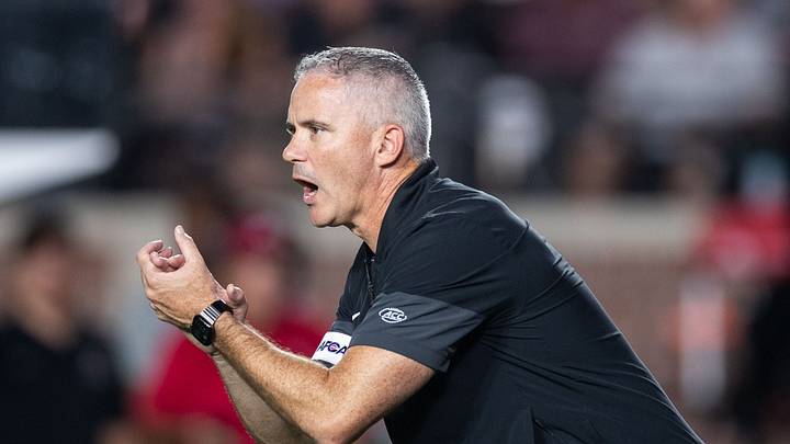 Florida State football coach Mike Norvell coaches his players as they warm up after the game was delayed due to a power outage. The SMU Mustangs beat the Florida State Seminoles 27-24 on Monday, Sept. 7, 2026. Florida State football coach Mike Norvell coaches his players as they warm up after the game was delayed due to a power outage. The SMU Mustangs beat the Florida State Seminoles 27-24 on Monday, Sept. 7, 2026.