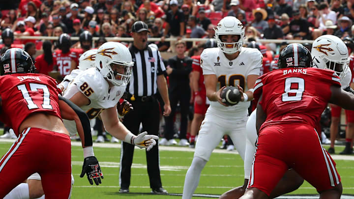 Sep 21, 2024; Lubbock, Texas, USA;  Arizona State Sun Devils quarterback Sam Leavitt (10) takes a snap against the Texas Tech Red Raiders in the first half at Jones AT&T Stadium and Cody Campbell Field. Mandatory Credit: Michael C. Johnson-Imagn Images
