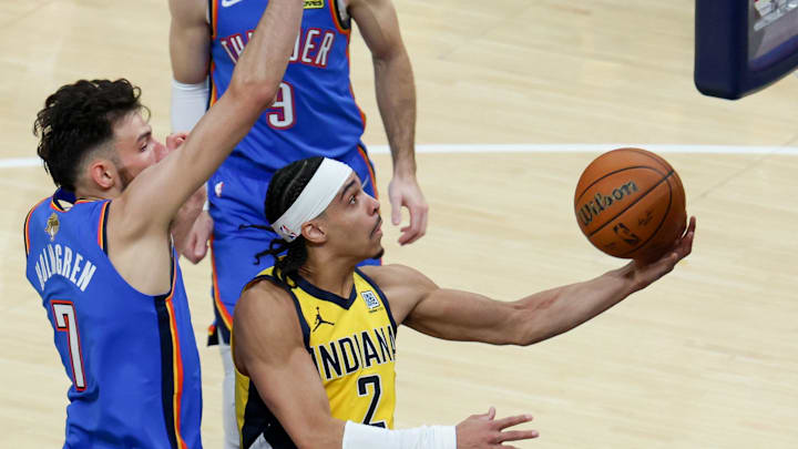 Indiana Pacers guard Andrew Nembhard (2) shoots the ball defended by Oklahoma City Thunder forward Chet Holmgren (7) in the second quarter during game six of the 2025 NBA Finals at Gainbridge Fieldhouse.