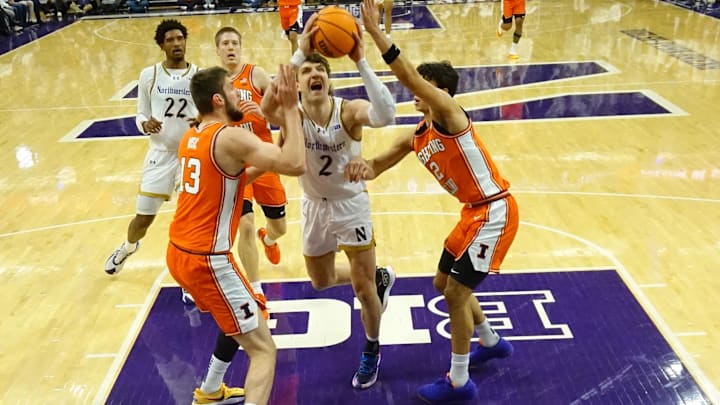 Jan 14, 2026; Evanston, Illinois, USA; Illinois Fighting Illini center Tomislav Ivisic (13) guard Andrej Stojakovic (2) defends Northwestern Wildcats forward Nick Martinelli (2) during the first half at Welsh-Ryan Arena. Mandatory Credit: David Banks-Imagn Images Jan 14, 2026; Evanston, Illinois, USA; Illinois Fighting Illini center Tomislav Ivisic (13) guard Andrej Stojakovic (2) defends Northwestern Wildcats forward Nick Martinelli (2) during the first half at Welsh-Ryan Arena. Mandatory Credit: David Banks-Imagn Images