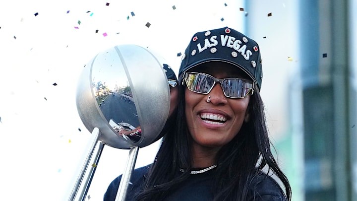 Oct 17, 2025; Las Vegas, NV, USA; Las Vegas Aces center A'Ja Wilson (22) celebrates during the 2025 WNBA Championship parade at Toshiba Plaza. Mandatory Credit: Stephen R. Sylvanie-Imagn Images Oct 17, 2025; Las Vegas, NV, USA; Las Vegas Aces center A'Ja Wilson (22) celebrates during the 2025 WNBA Championship parade at Toshiba Plaza. Mandatory Credit: Stephen R. Sylvanie-Imagn Images