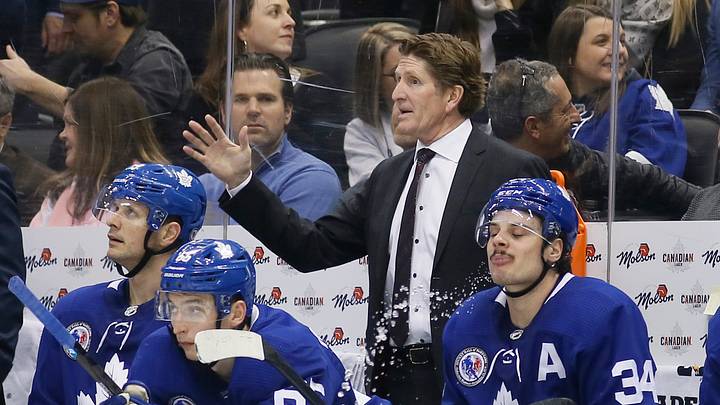 Nov 15, 2019; Toronto, Ontario, CAN; Toronto Maple Leafs head coach Mike Babcock and forward Auston Matthews (34) on the bench against the Boston Bruins at Scotiabank Arena. Boston defeated Toronto. Mandatory Credit: John E. Sokolowski-USA TODAY Sports Nov 15, 2019; Toronto, Ontario, CAN; Toronto Maple Leafs head coach Mike Babcock and forward Auston Matthews (34) on the bench against the Boston Bruins at Scotiabank Arena. Boston defeated Toronto. Mandatory Credit: John E. Sokolowski-USA TODAY Sports