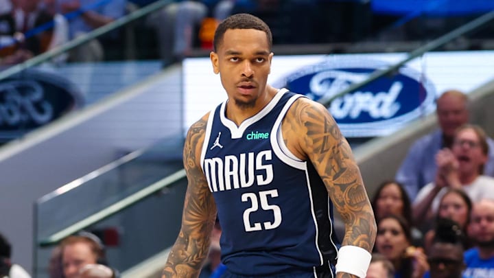 Apr 5, 2024; Dallas, Texas, USA;  Dallas Mavericks forward P.J. Washington (25) reacts after scoring