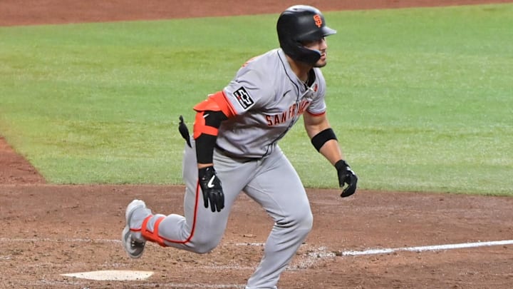 Sep 23, 2024; Phoenix, Arizona, USA; San Francisco Giants outfielder Michael Conforto (8) doubles in the seventh inning against the Arizona Diamondbacks at Chase Field. Sep 23, 2024; Phoenix, Arizona, USA; San Francisco Giants outfielder Michael Conforto (8) doubles in the seventh inning against the Arizona Diamondbacks at Chase Field.
