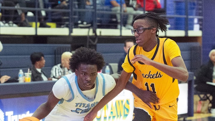 Richland's Phil Nelson (20) drives toward the basket past Starkville defender Justin Green (11) during the BA$$A Holiday Invitational 2023 in Clinton, Miss., Saturday, Dec. 23, 2023.