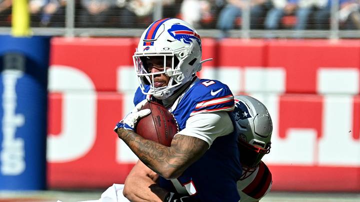 Oct 4, 2026; Orchard Park, New York, USA;  Buffalo Bills wide receiver DJ Moore #2 runs after making a catch during the first quarter against the New England Patriots
