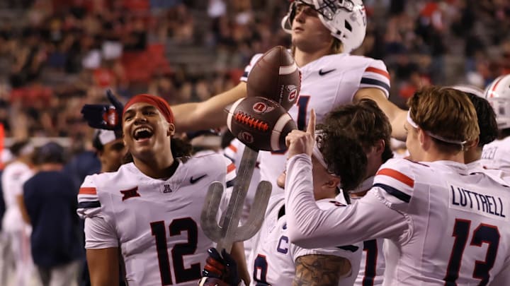 Sep 28, 2024; Salt Lake City, Utah, USA; The Arizona Wildcats celebrate a win over the Utah Utes at Rice-Eccles Stadium. Mandatory Credit: Rob Gray-Imagn Images