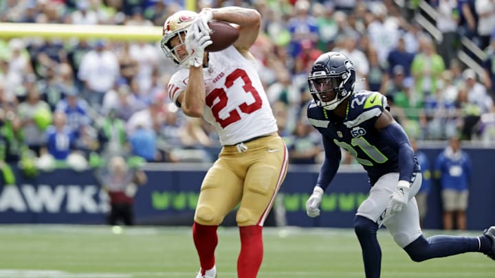 Sep 7, 2025; Seattle, Washington, USA; San Francisco 49ers running back Christian McCaffrey (23) runs the ball during the first half against San Francisco 49ers at Lumen Field. | 