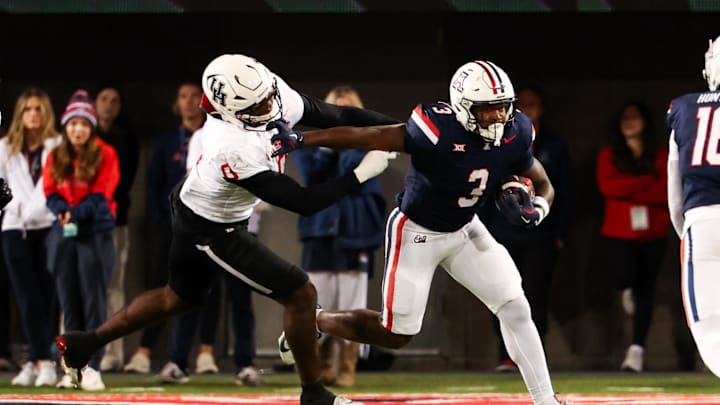 Nov 15, 2024; Tucson, Arizona, USA; Arizona Wildcats running back Kedrick Reescano (3) runs with the ball during the fourth quarter against the Houston Cougars at Arizona Stadium. Mandatory Credit: Aryanna Frank-Imagn Images