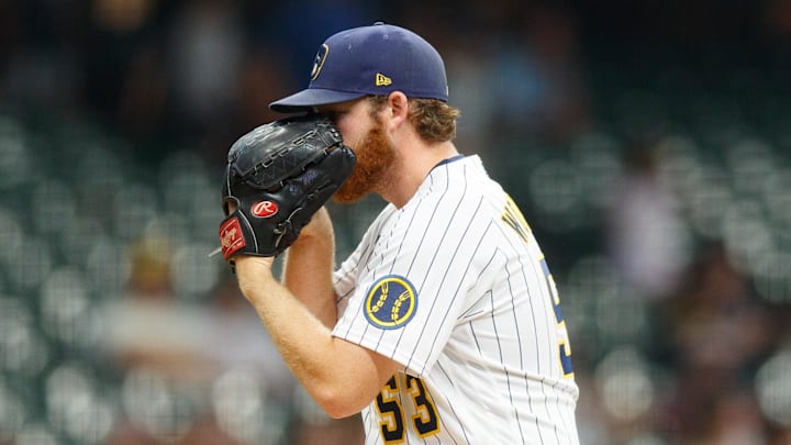 Jun 11, 2021; Milwaukee, Wisconsin, USA;  Milwaukee Brewers pitcher Brandon Woodruff (53) looks in for the sign during the first inning against the Pittsburgh Pirates at American Family Field. Mandatory Credit: Jeff Hanisch-Imagn Images