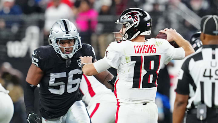 Dec 16, 2024; Paradise, Nevada, USA; Las Vegas Raiders linebacker Amari Burney (56) looks to sack Atlanta Falcons quarterback Kirk Cousins (18) during the third quarter at Allegiant Stadium. Mandatory Credit: Stephen R. Sylvanie-Imagn Images