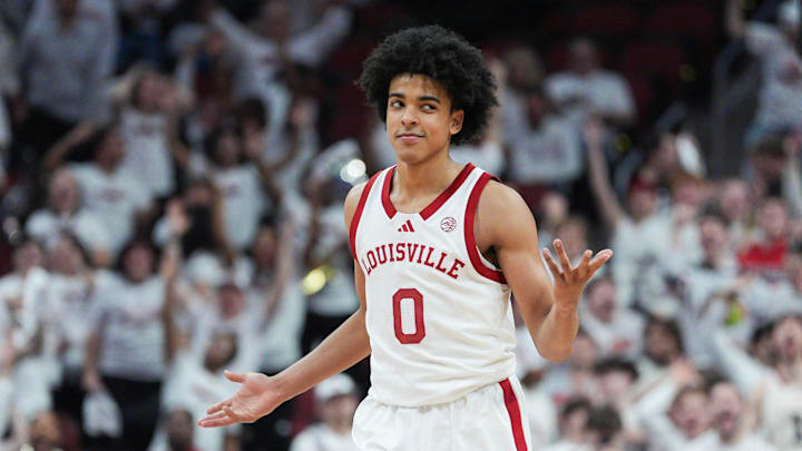 Louisville Cardinals guard Mikel Brown Jr. (0)