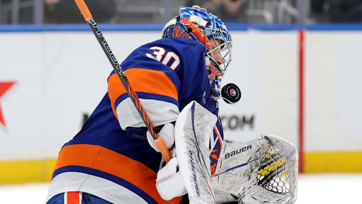 Oct 21, 2025; Elmont, New York, USA; New York Islanders goaltender Ilya Sorokin (30) makes a save against the San Jose Sharks during the third period at UBS Arena. Mandatory Credit: Brad Penner-Imagn Images