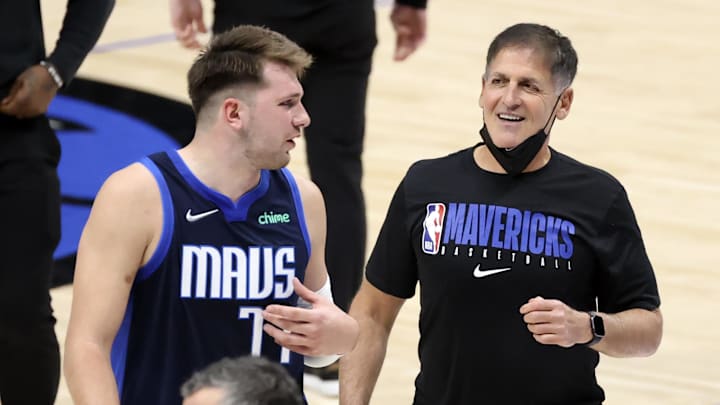 Apr 21, 2021; Dallas, Texas, USA;  Dallas Mavericks guard Luka Doncic (77) laughs with owner Mark Cuban after the game against the Detroit Pistons at American Airlines Center. Mandatory Credit: Kevin Jairaj-Imagn Images