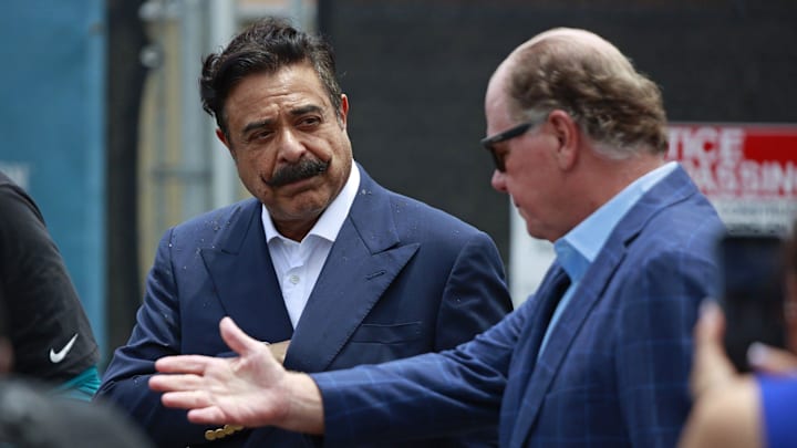 Jacksonville Jaguars owner Shad Khan talks with President Mark Lamping speaks as the business bearing the name on the new practice facility, Miller Electric Center, is announced during a media conference after a minicamp football practice Monday, June 13, 2022 at TIAA Bank Field in Jacksonville. [Corey Perrine/Florida Times-Union]

Jki Jagspracticefacility 0