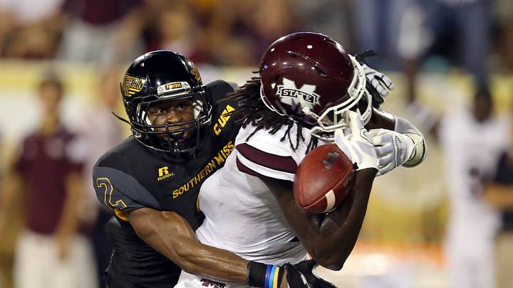 Sep 5, 2015; Hattiesburg, MS, USA; Mississippi State Bulldogs wide receiver De'Runnya Wilson (1) makes a catch while defended by Southern Miss Golden Eagles defensive back Trae Collins (2) in the second half of their game at M.M. Roberts Stadium. Mississippi State won, 34-16. Mandatory Credit: Chuck Cook-USA TODAY Sports Sep 5, 2015; Hattiesburg, MS, USA; Mississippi State Bulldogs wide receiver De'Runnya Wilson (1) makes a catch while defended by Southern Miss Golden Eagles defensive back Trae Collins (2) in the second half of their game at M.M. Roberts Stadium. Mississippi State won, 34-16. Mandatory Credit: Chuck Cook-USA TODAY Sports