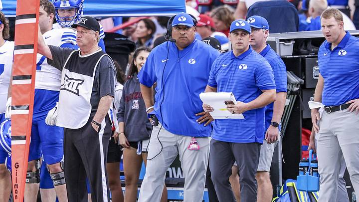 Oct 11, 2025; Tucson, Arizona, USA; Brigham Young Cougars head coach Kalani Sitake watches from the sidelines during the first quarter of the game against the Arizona Wildcats at Arizona Stadium. Mandatory Credit: Aryanna Frank-Imagn Images Oct 11, 2025; Tucson, Arizona, USA; Brigham Young Cougars head coach Kalani Sitake watches from the sidelines during the first quarter of the game against the Arizona Wildcats at Arizona Stadium. Mandatory Credit: Aryanna Frank-Imagn Images