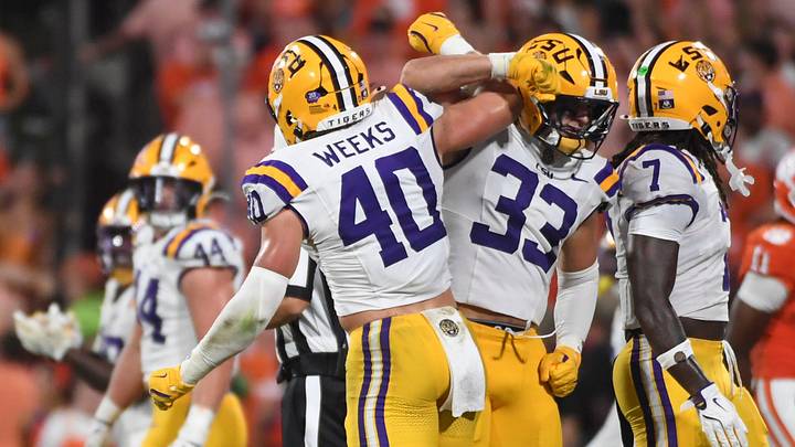 LSU Tigers linebacker Whit Weeks (40) and LSU Tigers linebacker West Weeks (33) celebrate after a defensive stop Saturday, Aug. 30, 2025 during the NCAA football game against the Clemson Tigers at Memorial Stadium in Clemson, South Carolina. LSU Tigers won 17-10. LSU Tigers linebacker Whit Weeks (40) and LSU Tigers linebacker West Weeks (33) celebrate after a defensive stop Saturday, Aug. 30, 2025 during the NCAA football game against the Clemson Tigers at Memorial Stadium in Clemson, South Carolina. LSU Tigers won 17-10.