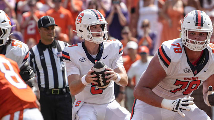 Sep 20, 2025; Clemson, South Carolina, USA; Syracuse Orange quarterback Steve Angeli (9) takes a snap near offensive lineman Joe Cruz (78) playing the Clemson Tigers during the first quarter at Memorial Stadium. Mandatory Credit: Ken Ruinard/GREENVILLE NEWS-USA TODAY Network via Imagn Images
