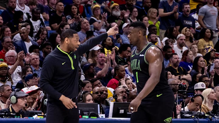 Apr 14, 2024; New Orleans, Louisiana, USA; New Orleans Pelicans head coach Willie Green gives direction to forward Zion Williamson (1) on a time out against the Los Angeles Lakers during the first half at Smoothie King Center. Mandatory Credit: Stephen Lew-Imagn Images Apr 14, 2024; New Orleans, Louisiana, USA; New Orleans Pelicans head coach Willie Green gives direction to forward Zion Williamson (1) on a time out against the Los Angeles Lakers during the first half at Smoothie King Center. Mandatory Credit: Stephen Lew-Imagn Images