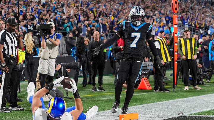 Colby Parkinson (84) scores on a pass play defended by Carolina Panthers safety Tre'von Moehrig 