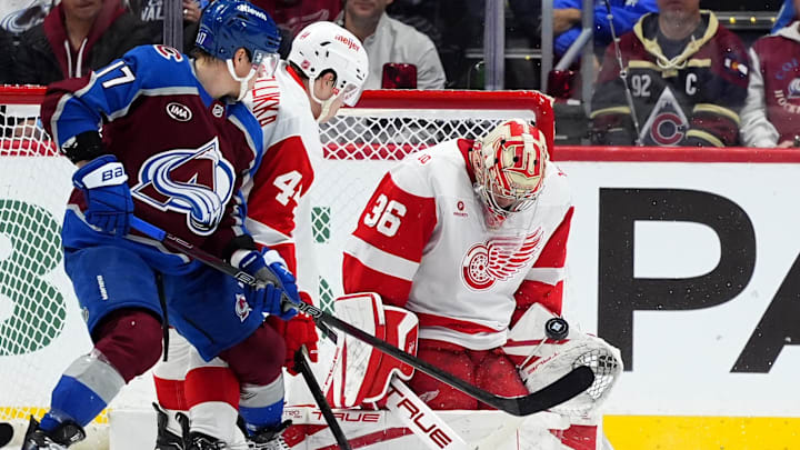 Feb 2, 2026; Denver, Colorado, USA; Detroit Red Wings goaltender John Gibson (36) makes a save next to defenseman Axel Sandin-Pellikka (44) and Colorado Avalanche center Parker Kelly (17) in the first period at Ball Arena. Mandatory Credit: Ron Chenoy-Imagn Images Feb 2, 2026; Denver, Colorado, USA; Detroit Red Wings goaltender John Gibson (36) makes a save next to defenseman Axel Sandin-Pellikka (44) and Colorado Avalanche center Parker Kelly (17) in the first period at Ball Arena. Mandatory Credit: Ron Chenoy-Imagn Images